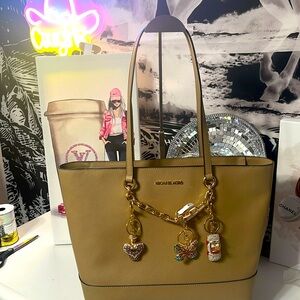 Michael Kors shoulder bag and wallet tan in color, Bundled